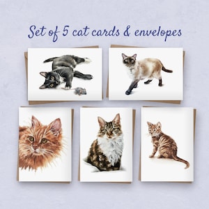 May include: Set of 5 cat cards and envelopes featuring watercolour illustrations of different cats. The cards are blank inside and perfect for sending a personalised message.