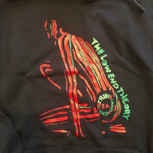 A Tribe Called Quest - Low End Theory. Black hoodie with red and green Low End Theory album graphics. 90s hip-hop