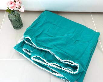 Handmade Muslin Baby Swaddle Blanket: Turquoise Cotton Pom Pom Trim