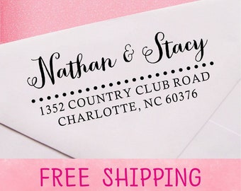 May include: A white return address label with black text. The text reads "Nathan & Stacy" followed by a line of dots and "1352 Country Club Road Charlotte, NC 60376".