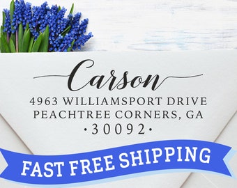 May include: A white envelope with a blue ribbon that says "FAST FREE SHIPPING". The envelope has a return address that says "Carson, 4963 WILLIAMSPORT DRIVE PEACHTREE CORNERS, GA. 30092."