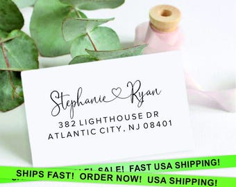 May include: White return address label with black text. The text reads "Stephanie Ryan", "382 Lighthouse Dr", "Atlantic City, NJ 08401". A small heart symbol is between the names.
