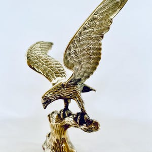 Brass eagle sculpture - large vintage bird figure / ornament .