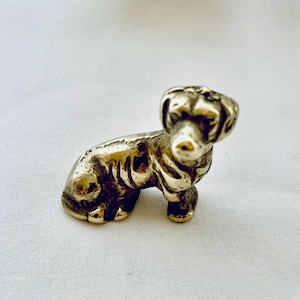 Brass miniature dachshund / sausage dog figurine.
