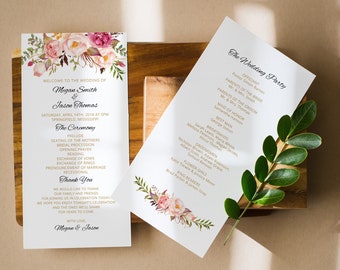 May include: Two wedding programs with floral designs and text. The left program reads "Welcome to the Wedding of Megan Smith & Jason Thomas." The right program lists the wedding party. Both are on a wooden surface.