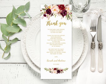 May include: A thank you card with a floral design in shades of burgundy, pink, and green. The text reads "Thank you" and includes a message of gratitude to family and friends for their support and love. The card is signed "Sarah and Andrew" and dated "10.12.2022".