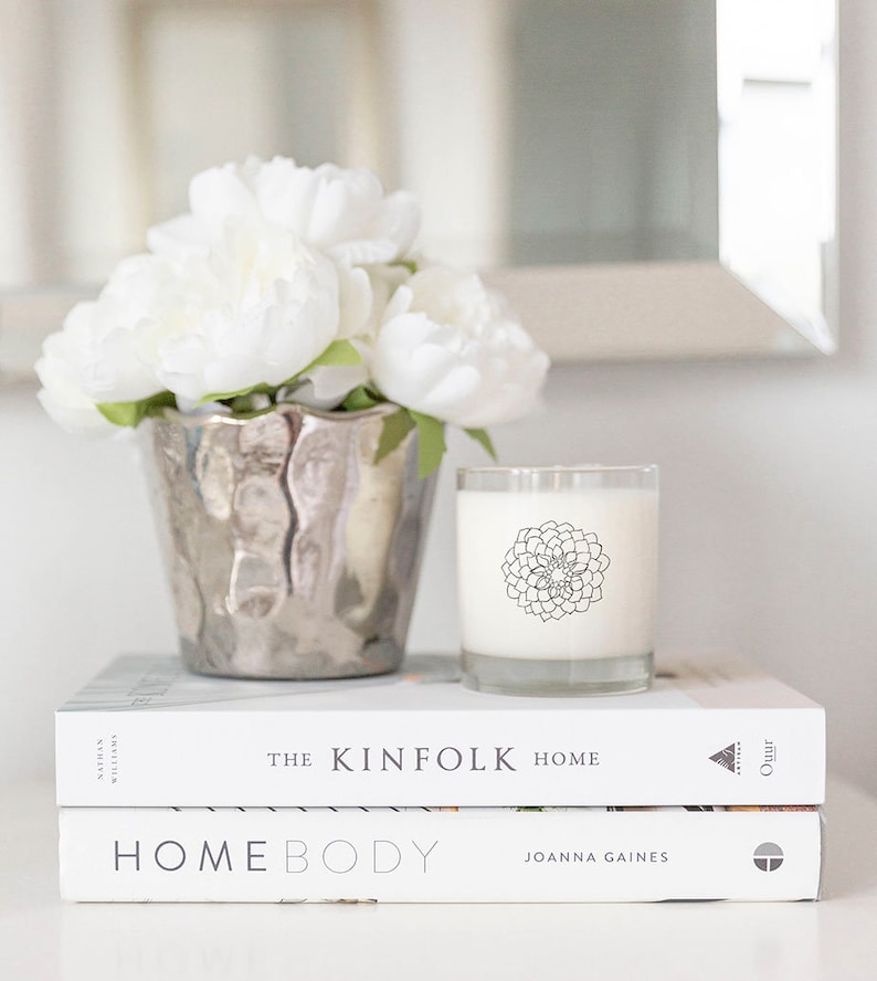 May include: A set of three ceramic vases in varying heights. The vases have a matte finish in shades of cream, beige, and brown. The tallest vase is approximately 10 inches high.