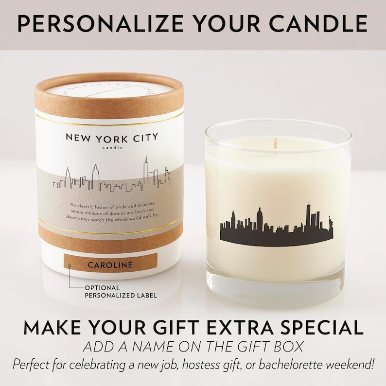 May include: Two candles, one in a cylindrical container and the other in a glass. Both feature a black skyline design and the words "New York City candle." The cylindrical candle has a personalized label. Text reads "Personalize Your Candle" and "Make Your Gift Extra Special."