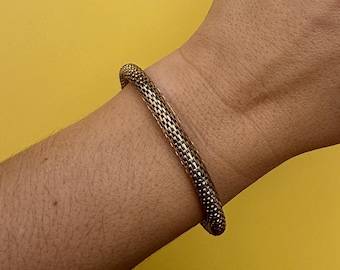 Pulsera elástica vintage de metal dorado de 8" de los años 80