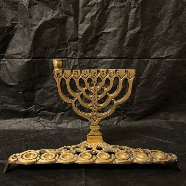 Vintage cast brass Menorah Hanukkah candle holder. Jewish High Holidays. Beautiful scrollwork. Excellent condition. Made in Israel. Stamped.