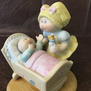 Vintage Cabbage Patch kids ceramic figurine. Bisque porcelain, hand painted, stamped, signed Xavier Roberts. Excellent condition. 1984.