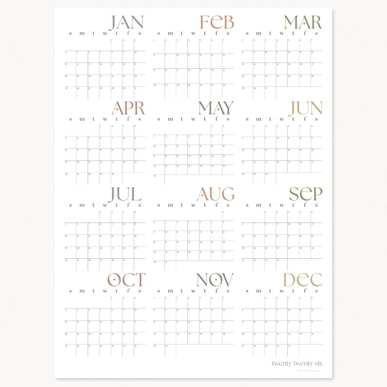 May include: A printable calendar for the year 2026. Each month is displayed in a separate box with the month name in a different color. The calendar is designed in a minimalist style with a simple grid layout.
