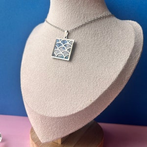 Stainless steel wave pendant inspired by prints