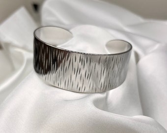 Bracelet manchette réglable acier inoxydable argenté