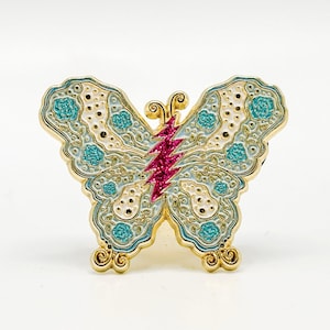 Pin de esmalte de mariposa rosa y turquesa de Grateful Dead