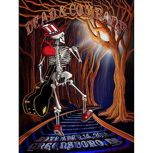May include: A poster for a Dead & Company concert in Greensboro, North Carolina on November 14, 2015. The poster features a skeleton wearing a red, white, and blue hat and carrying a guitar case. The skeleton is walking down a path in a forest.