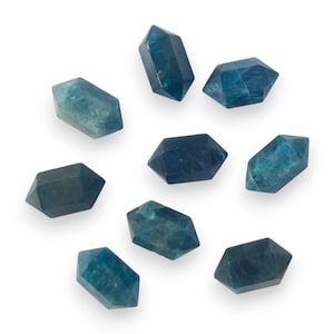 May include: A collection of nine blue apatite crystal points, each with a unique shape and shade of blue.
