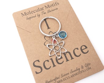 Atom Geburtsstein Charm Schlüsselanhänger-Atom Molekül Charm-Nukleus-Wissenschaft Geschenk-Chemie Geschenk-Weihnachten Geschenk-Abschluss Geschenk-Strümpfe