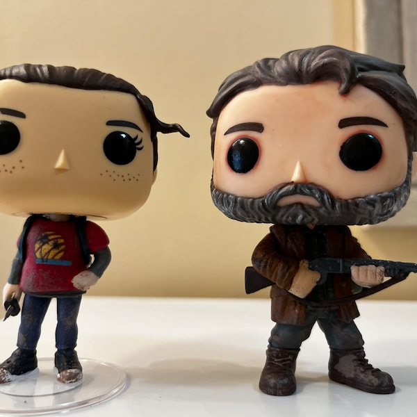 The last of us custom vinyl figures Joel Miller, and Ellie Williams. Version A. Set of 2