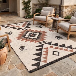 Handwoven braided Jute Rug in Southwestern boho style Eco-friendly hemp Native inspired design perfect for farmhouse indoor/outdoor décor