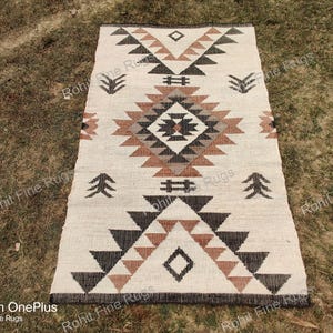 Handwoven braided Jute Rug in Southwestern boho style Eco-friendly hemp Native inspired design perfect for farmhouse indoor/outdoor décor