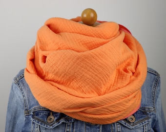 Muslin cloth in various sizes for women and children. Orange scarf