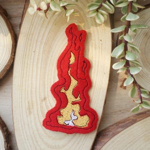 Écusson flammé (à coudre), appliqué brodé en feu de laine