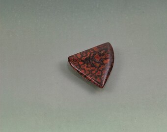 Dinosaur gem bone freeform triangle cabochon polished both sides red brown ring stone. Utah cabochon 16 mm x 17 mm x 3 mm. 7 carats.