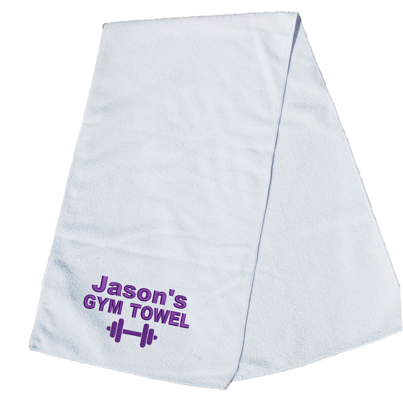 May include: White gym towel with purple embroidery that says "Jason's Gym Towel" with a purple dumbbell icon.