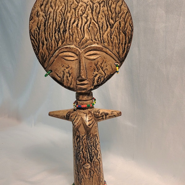 13 inches tall vintage Wooden African Statue with beads.