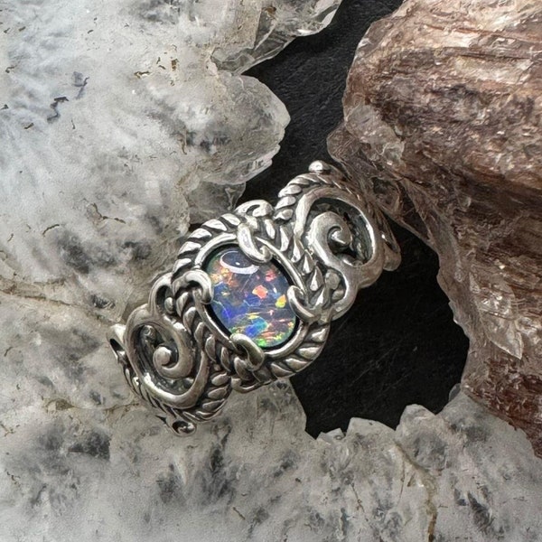 Anillo de plata de ley con ópalo ovalado decorado de Carolyn Pollack para mujer, disponible en varias tallas.