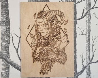 The Warrior Tiefling Druid wood burned art piece.