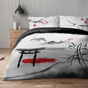 May include: A king-size duvet cover with a black and white Japanese-inspired design. The duvet cover features a red and white torii gate, a mountain range, bamboo stalks, and cherry blossoms.