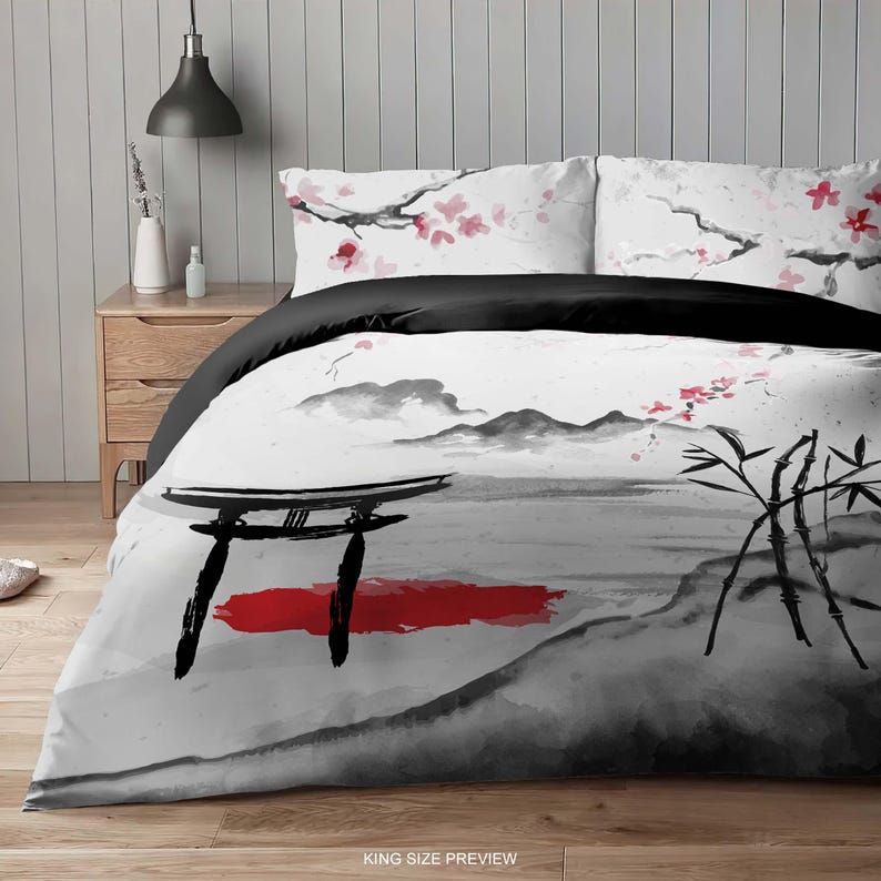 May include: A king-size duvet cover with a black and white Japanese-inspired design. The duvet cover features a red and white torii gate, a mountain range, bamboo stalks, and cherry blossoms.