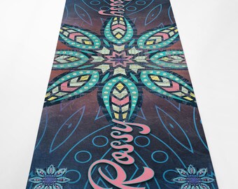 May include: A blue yoga mat with a colorful mandala design and the word "Rococo" written in pink.