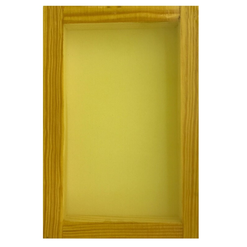 May include: A wooden frame with a yellow background. The frame is made of natural wood and has a simple design.
