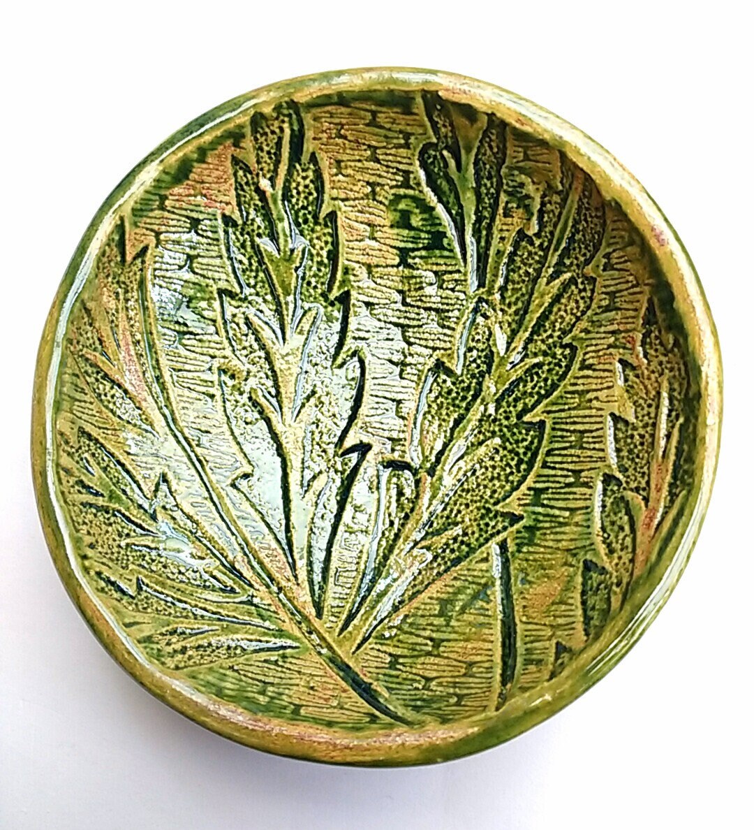 A Green Ceramic / pottery bowl with nature inspired decoration Etsy