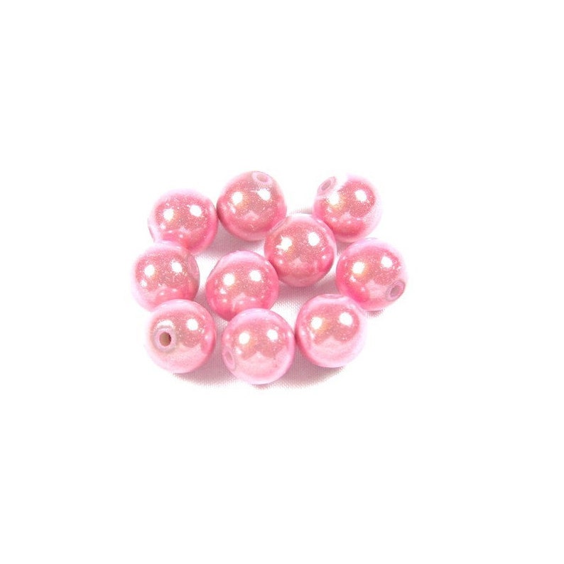 50 miracle pink magic beads 8 mm