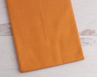 Tela de algodón acolchada geométrica naranja cortada a medida