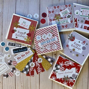 This fun holiday card kit comes with everything but the pen to write your warm and cozy greeting.