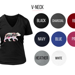 May include: Black V-neck t-shirt with a floral mama bear graphic. The shirt is available in 10 colors: black, charcoal, red, navy, blue, pink, heather, white.