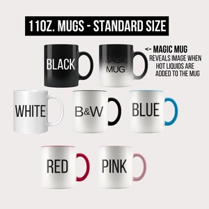 May include: Set of 11 ounce ceramic mugs in various colours, including black, white, blue, red, and pink. The black mug is a colour-changing mug that reveals a hidden image when hot liquids are added. The text "MAGIC MUG" is printed on the mug.