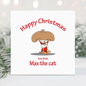 Carte de Noël drôle personnalisée - Carte de Noël personnalisée - Chat soulevant le sac du Père Noël - Noël du chat - Amoureux des chats de Noël - Amoureux des animaux de compagnie