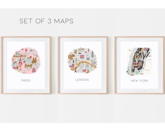 Puede incluir: Conjunto de tres mapas enmarcados de París, Londres y Nueva York. Cada mapa es una ilustración estilizada de la ciudad con monumentos y otros elementos notables.