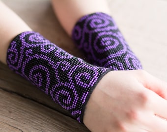 Beautiful black color decorated with purple and black beads wristlets / wrist warmers / arm warmers knitted from wool