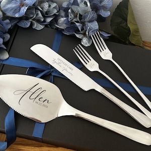 May include: A silver cake serving set with a cake server, knife, and two forks. The cake server is engraved with the name "Allen" and the date "06.22.2024". The knife is engraved with "Let's eat cake Together forever". The forks are engraved with "His" and "Hers".