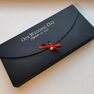 Kartonnen geschenkdoos met gepersonaliseerde gravure.