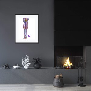 May include: A framed anatomical illustration of a human leg, showing the muscles and tendons. The leg is drawn in shades of pink, purple, and yellow, with a white background. The image is framed in black and hangs on a gray wall.