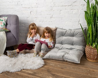 Vertbaudet floor clearance cushion