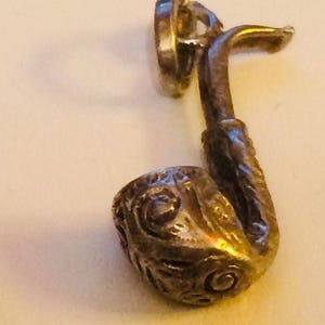 Lote de dijes de plata de ley: Cabra, Pipa y Minicasa